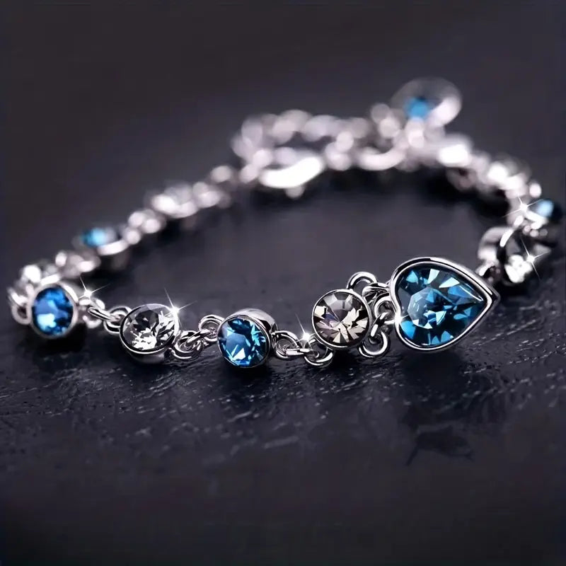 Pulsera de Cadena con Corazón de Zafiro Plateado