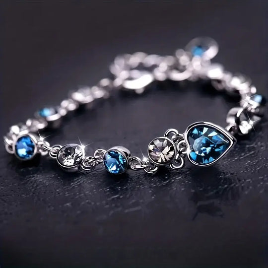 Pulsera de Cadena con Corazón de Zafiro Plateado