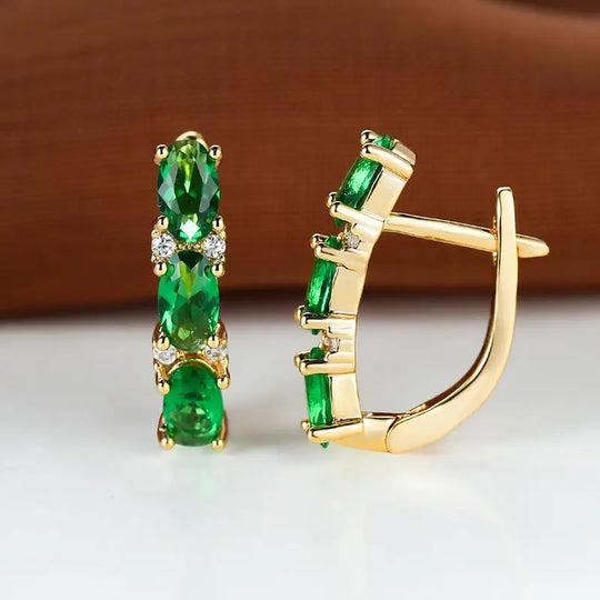 Pendientes de aro vertical de oro y esmeralda