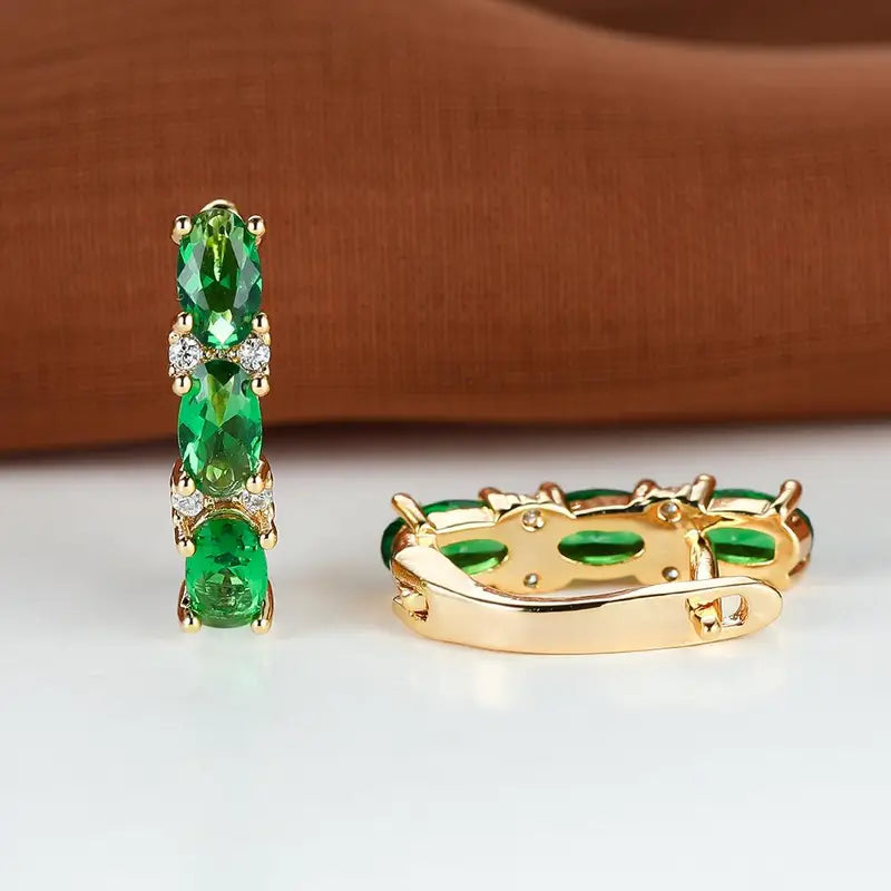 Pendientes de aro vertical de oro y esmeralda