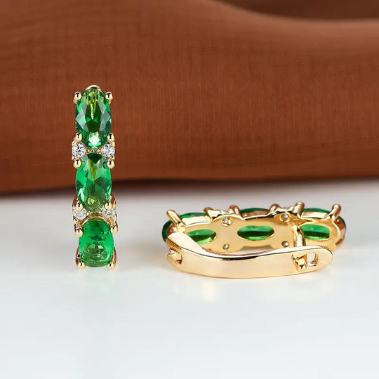 Pendientes de aro vertical de oro y esmeralda