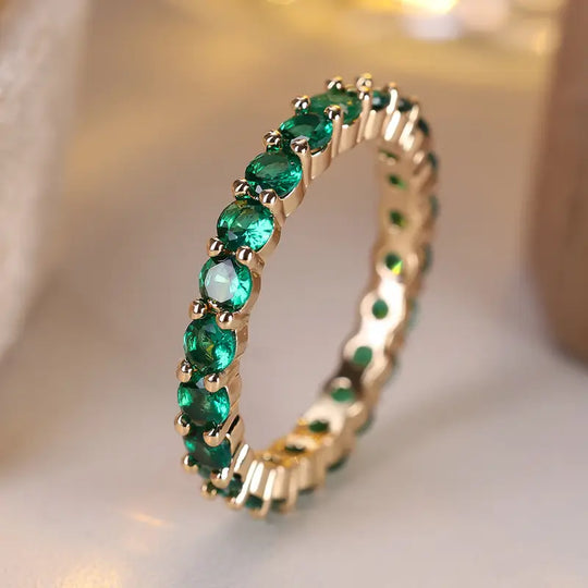 Anillo de Eternidad de Esmeralda Dorada