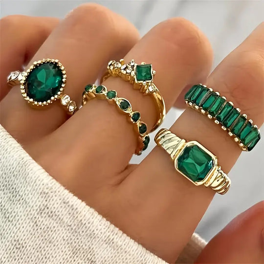 Conjunto de Anillos de Oro y Esmeralda