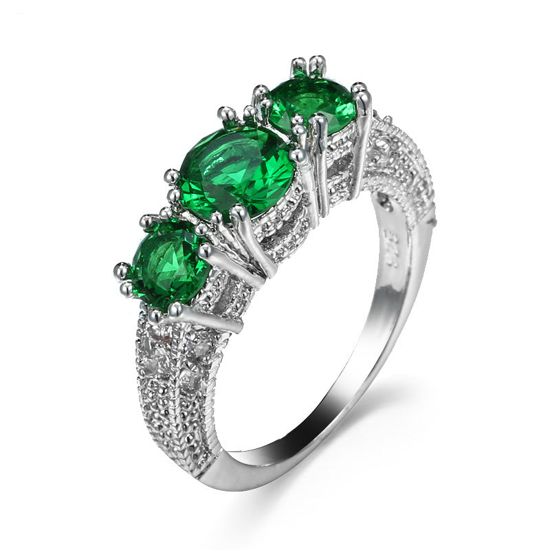 Anillo de Tres Piedras con Esmeralda Plateada