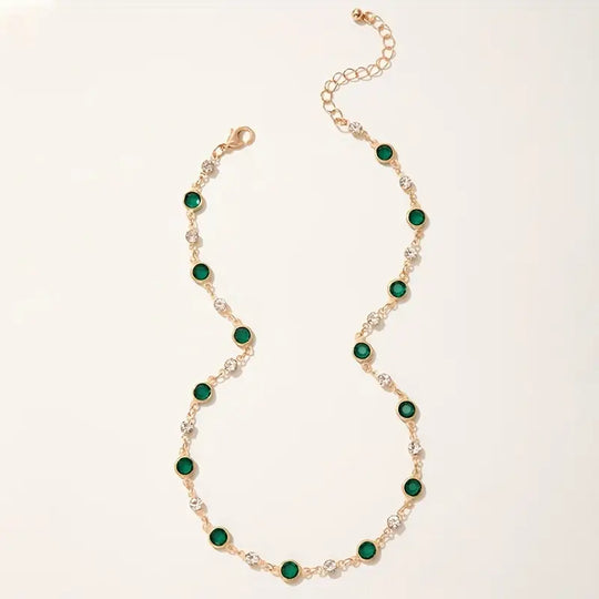 Collar de Estación de Esmeralda Dorada