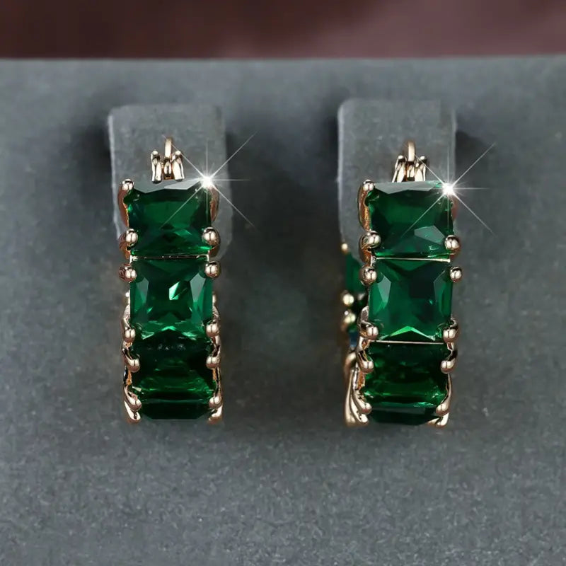 Pendientes de aro gruesos de oro y esmeralda