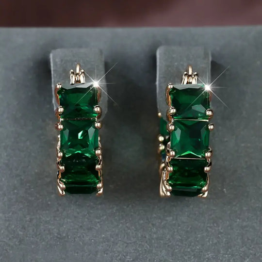 Pendientes de aro gruesos de oro y esmeralda