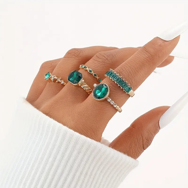 Conjunto de Anillos de Oro y Esmeralda