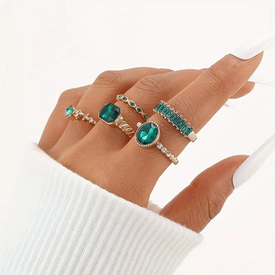 Conjunto de Anillos de Oro y Esmeralda