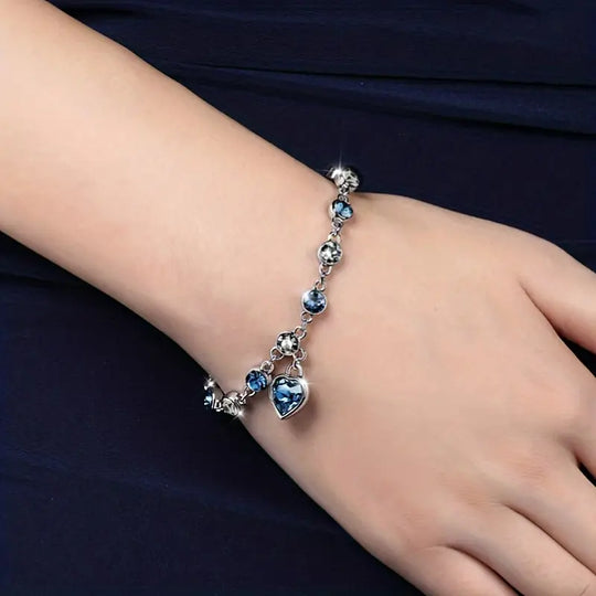 Pulsera de Cadena con Corazón de Zafiro Plateado