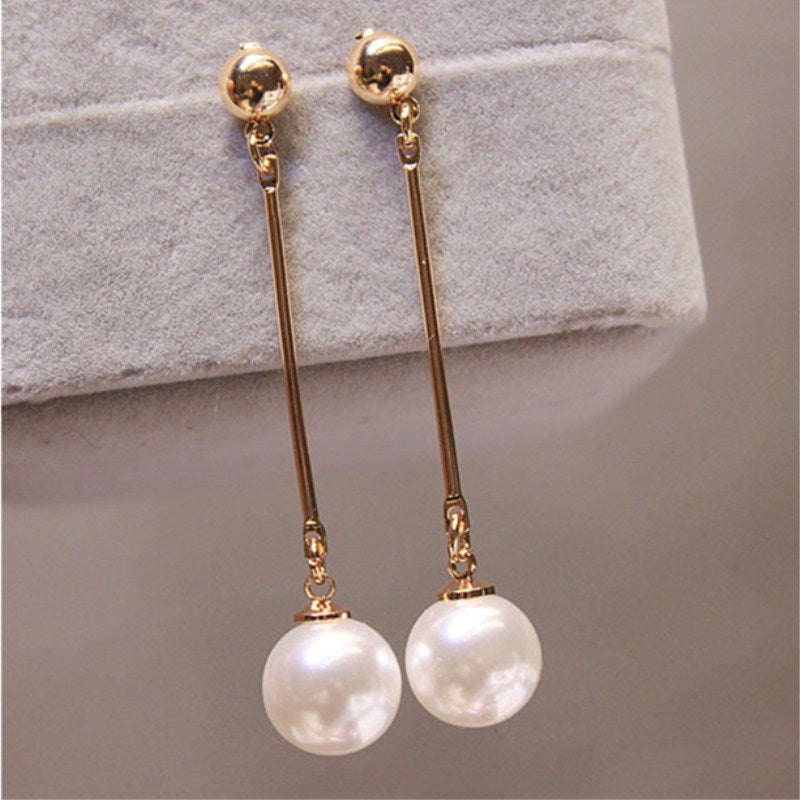 Pendientes Largos de Perlas Doradas