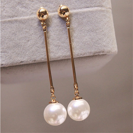 Pendientes Largos de Perlas Doradas