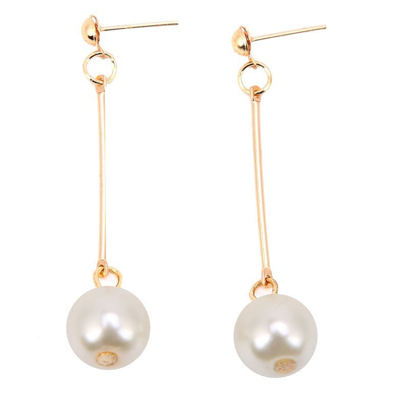 Pendientes Largos de Perlas Doradas