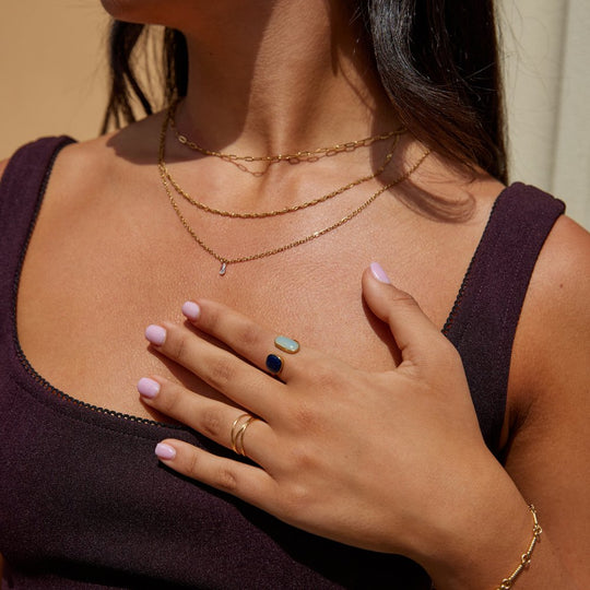 Anillo Abierto de Doble Piedra Dorada