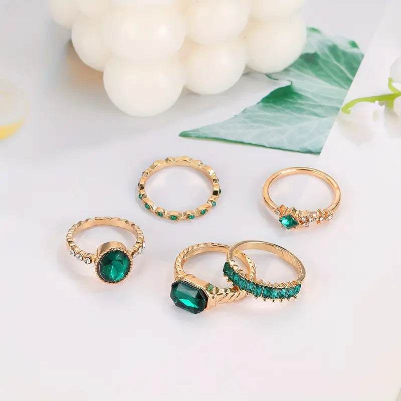 Conjunto de Anillos de Oro y Esmeralda